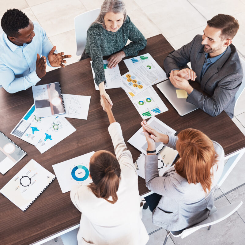 Launch An Effective Social Media Presence For Busy Executives article banner featuring group of people in a strategy meeting